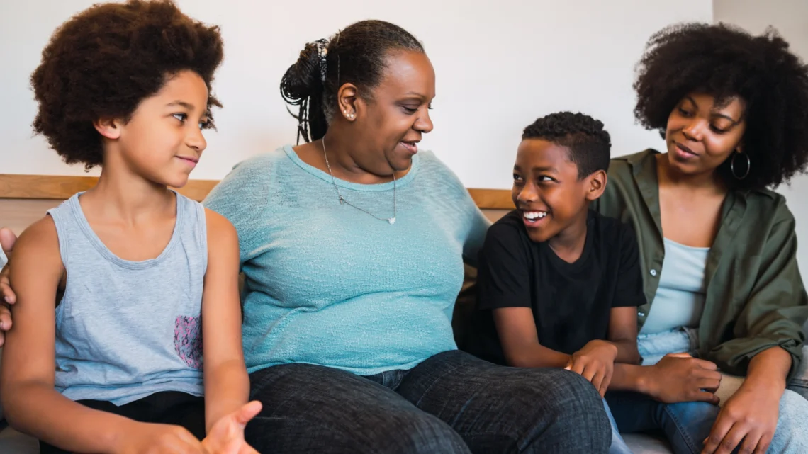 Person having a calm conversation with family about their will and estate planning at home